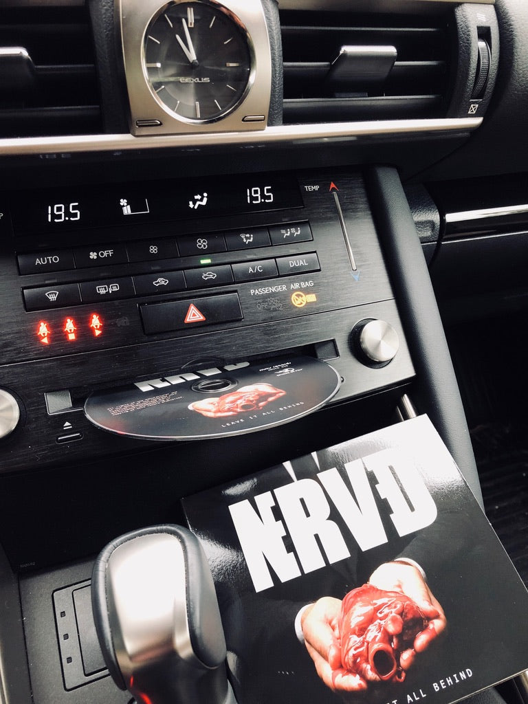 Leave It All Behind – NERVED CD in car stereo